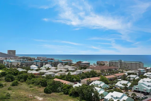 a view of a balcony with an ocean view