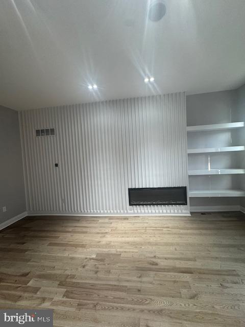 1809 Christian Street Philadelphia, PA 19146 - Photo 2 of 20 a view of an empty room with wooden floor