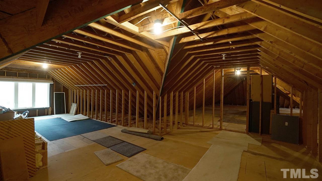 2708 Alloway Court Raleigh, NC 27606 - Photo 26 of 29 Walk up attic- Lots of storage or Room to grow. Roughed in for a full bath