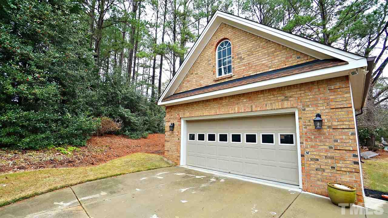 2708 Alloway Court Raleigh, NC 27606 - Photo 6 of 29 Oversized garage + detached, oversized 2 car garage that is insulated w/ pull down attic for additional storage (26x24)