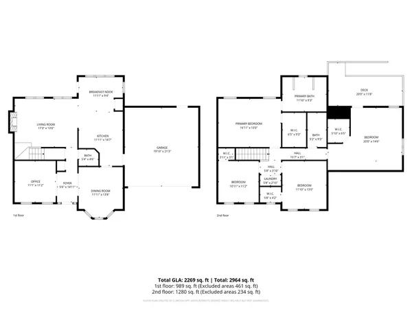 an aerial view of a house with a yard and seating space