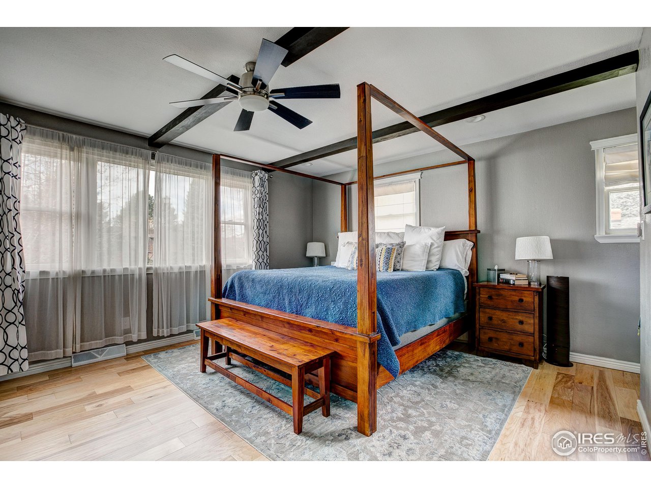 1912 Homestead Road Greeley, CO 80634 - Photo 21 of 40 Primary Suite with wood flooring and Ceiling fan