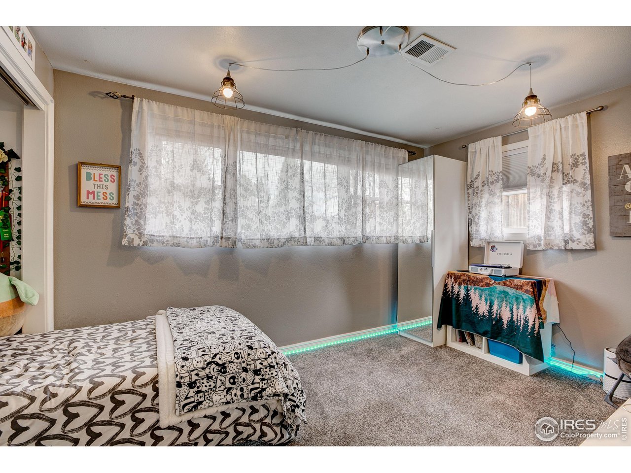 1912 Homestead Road Greeley, CO 80634 - Photo 26 of 40 Large lower level bedroom 2 with garden level windows makes this super bright