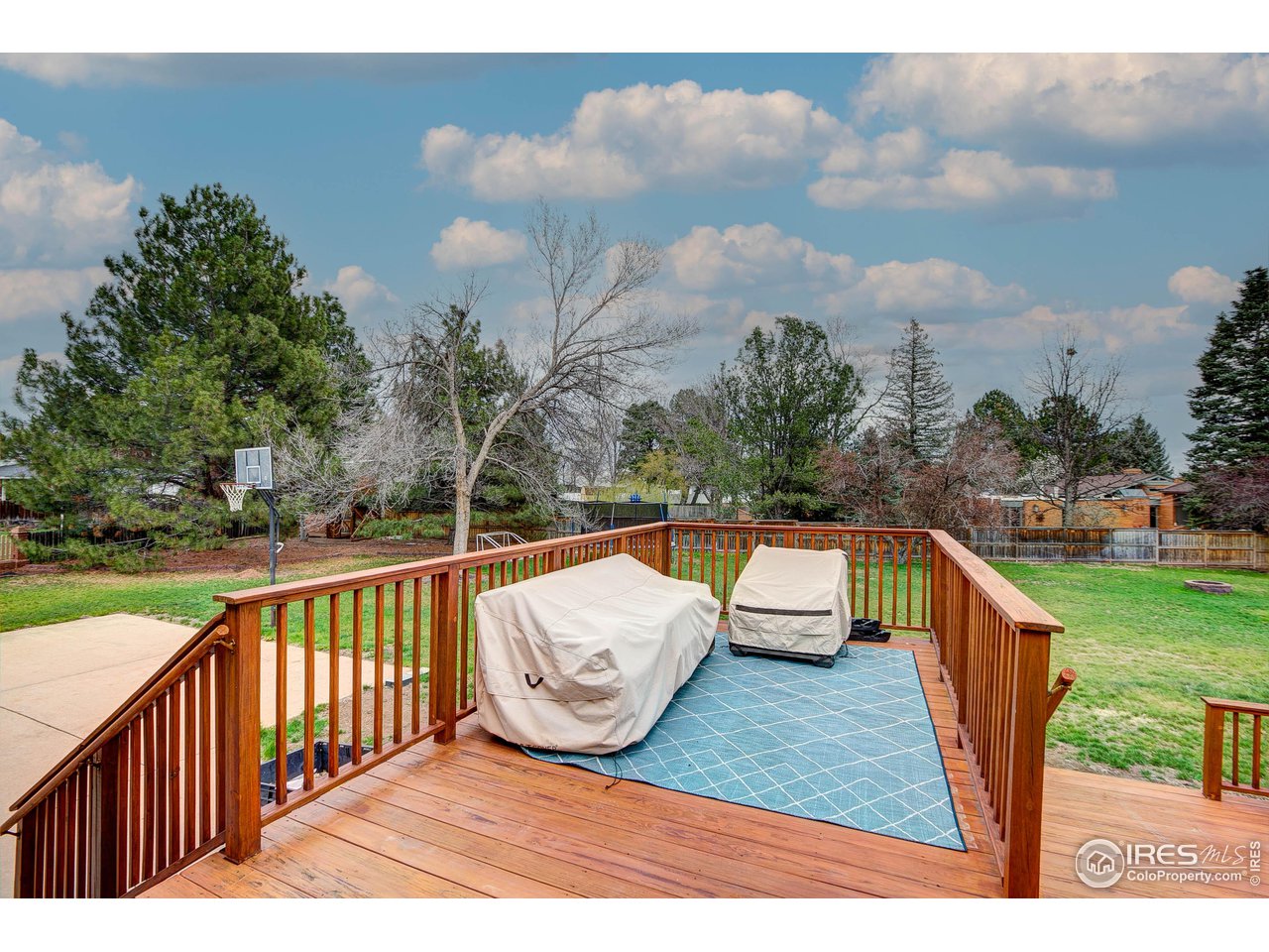 1912 Homestead Road Greeley, CO 80634 - Photo 34 of 40 Walk out from the Dining room sliding door to this private and incredible back deck, imagine the possiblities