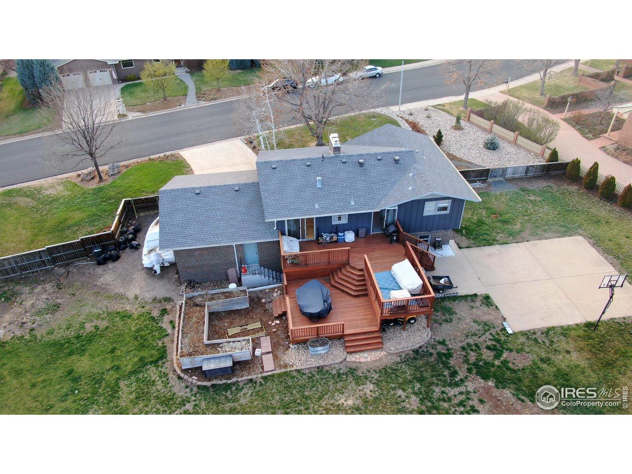 1912 Homestead Road Greeley, CO 80634 - Photo 35 of 40 Two tiered deck is massive and private