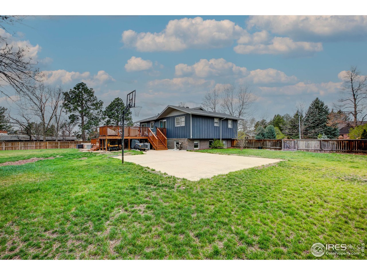 1912 Homestead Road Greeley, CO 80634 - Photo 36 of 40 Sports court or convert to pickleball court or perhaps park your toys in this incredible parcel.