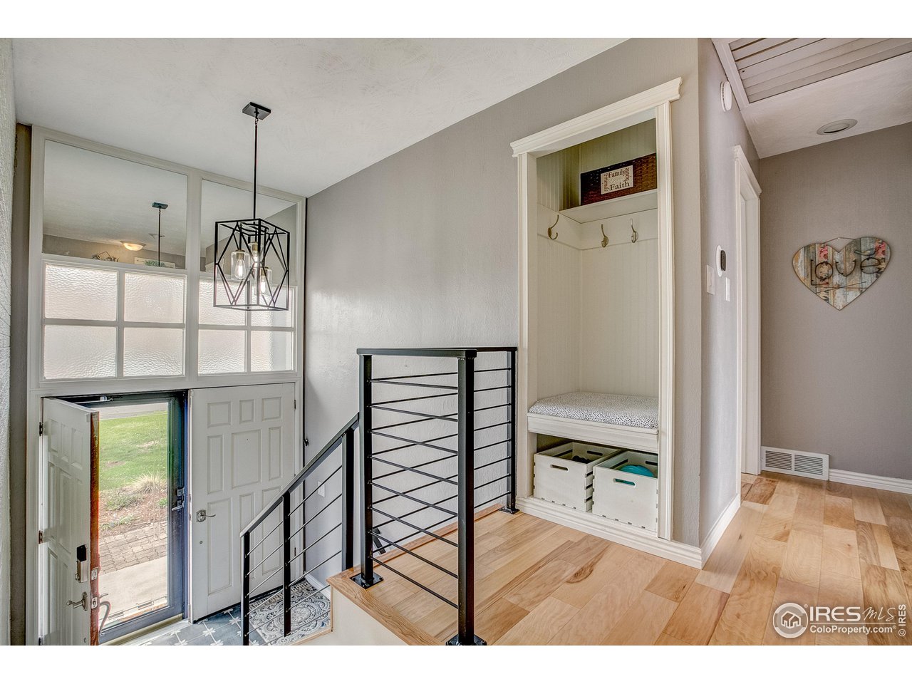 1912 Homestead Road Greeley, CO 80634 - Photo 8 of 40 Inviting entry and built in mud bench on the upper level