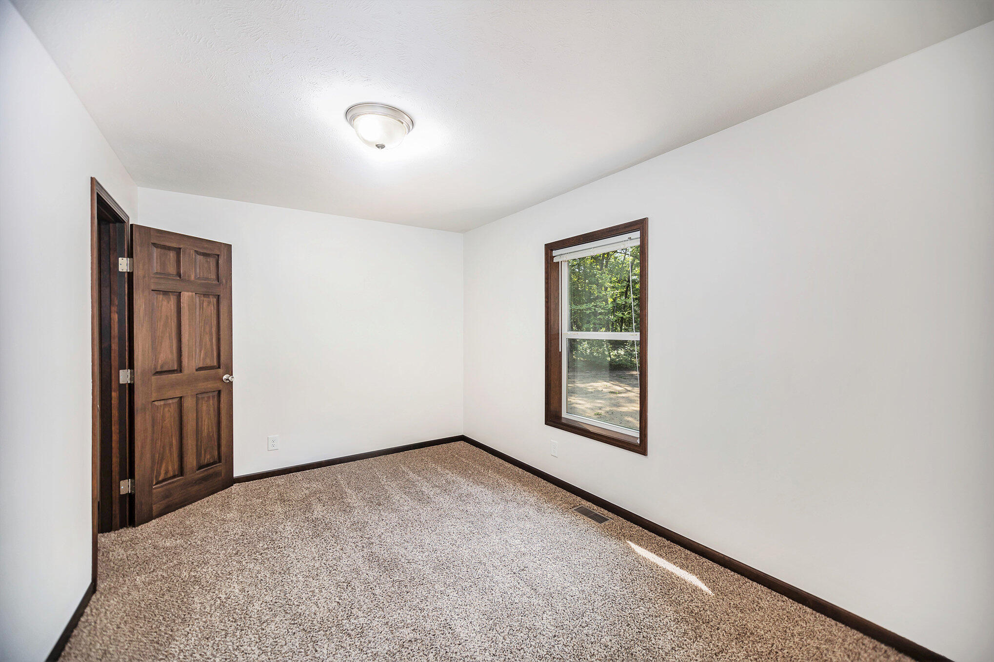 1600 Skeels Road Holton, MI 49425 - Photo 31 of 51 Bedroom 3