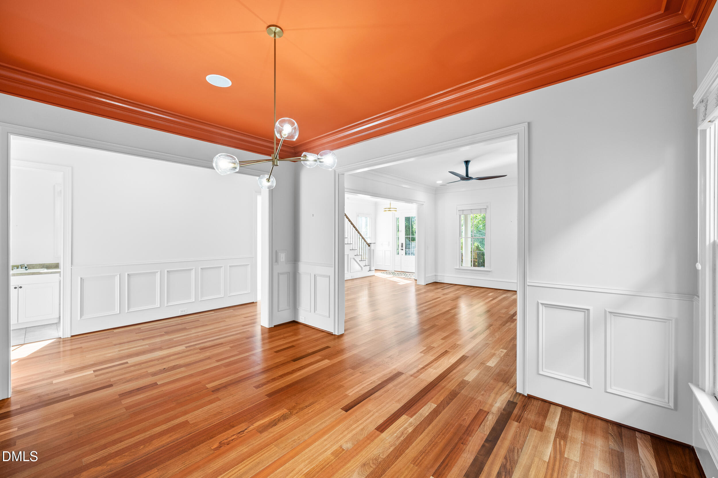 3100 Raymond Street Raleigh, NC 27607 - Photo 12 of 50 a view of a room with wooden floor and door