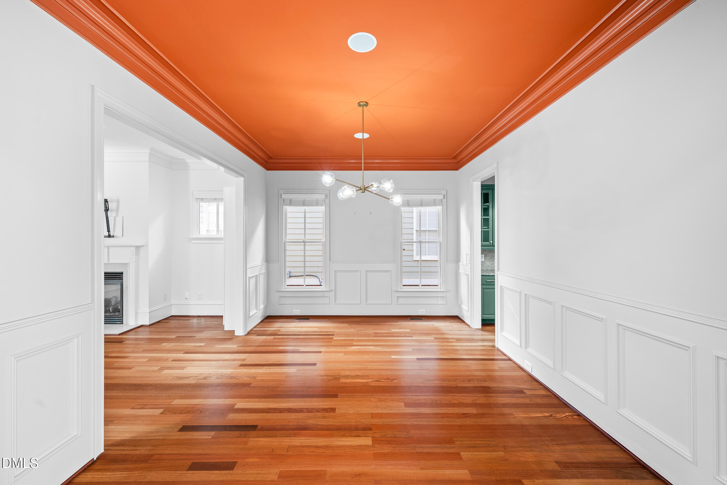3100 Raymond Street Raleigh, NC 27607 - Photo 13 of 50 a view of an empty room with window and wooden floor