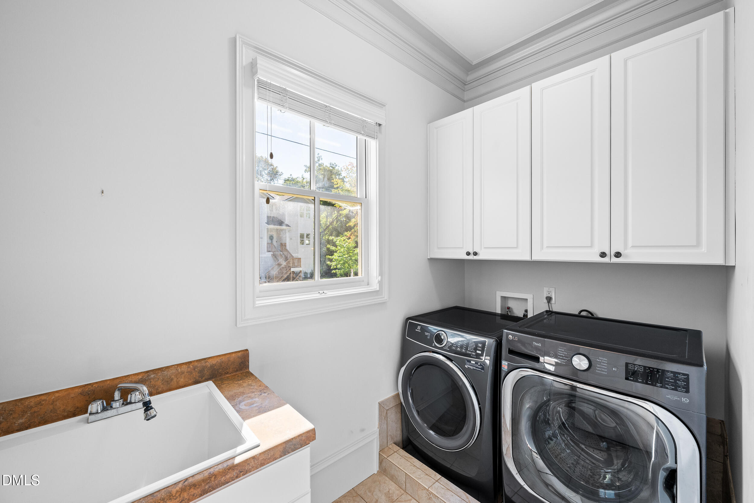 3100 Raymond Street Raleigh, NC 27607 - Photo 23 of 50 a utility room with dryer and washer