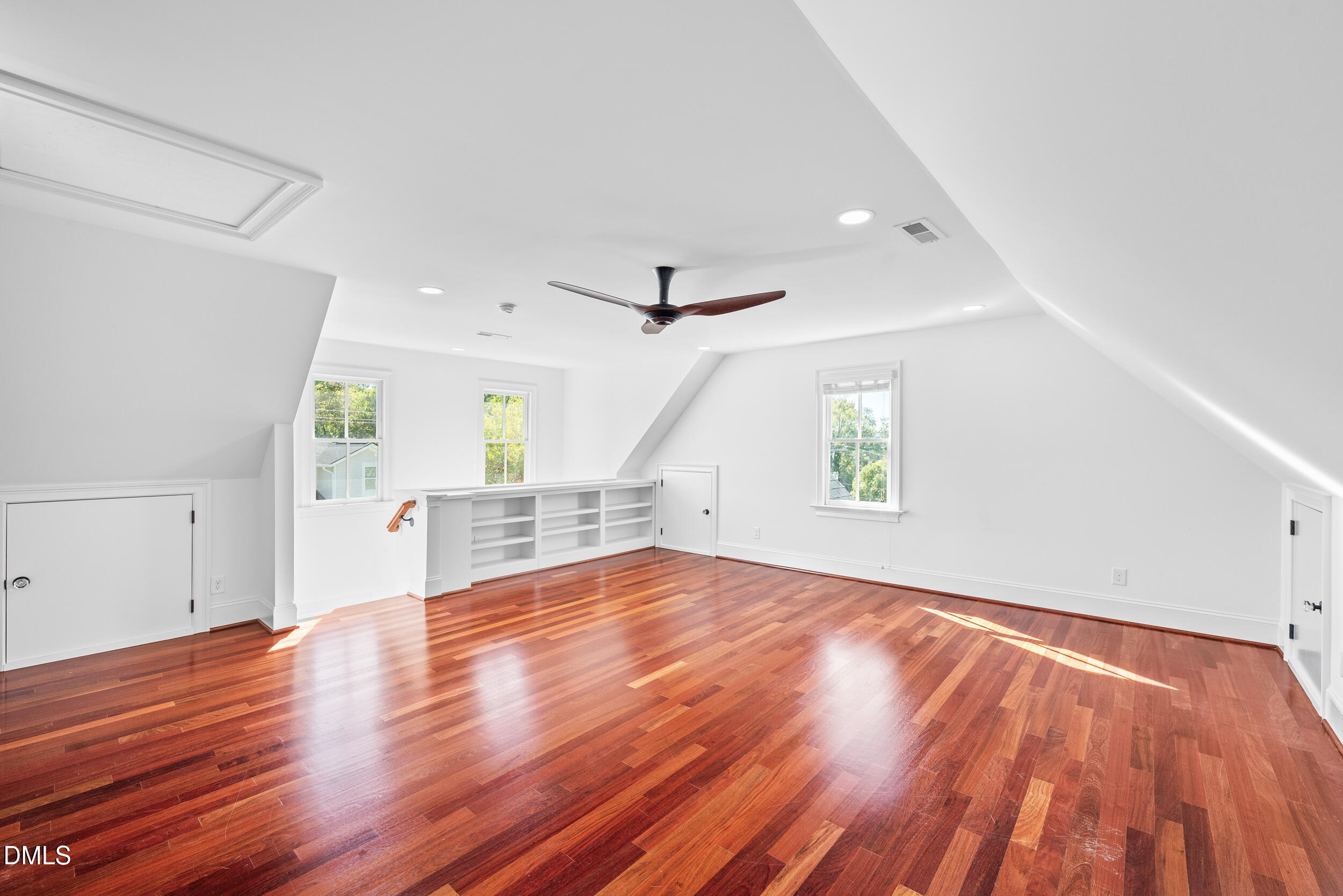 3100 Raymond Street Raleigh, NC 27607 - Photo 36 of 50 wooden floor in an empty room with a window