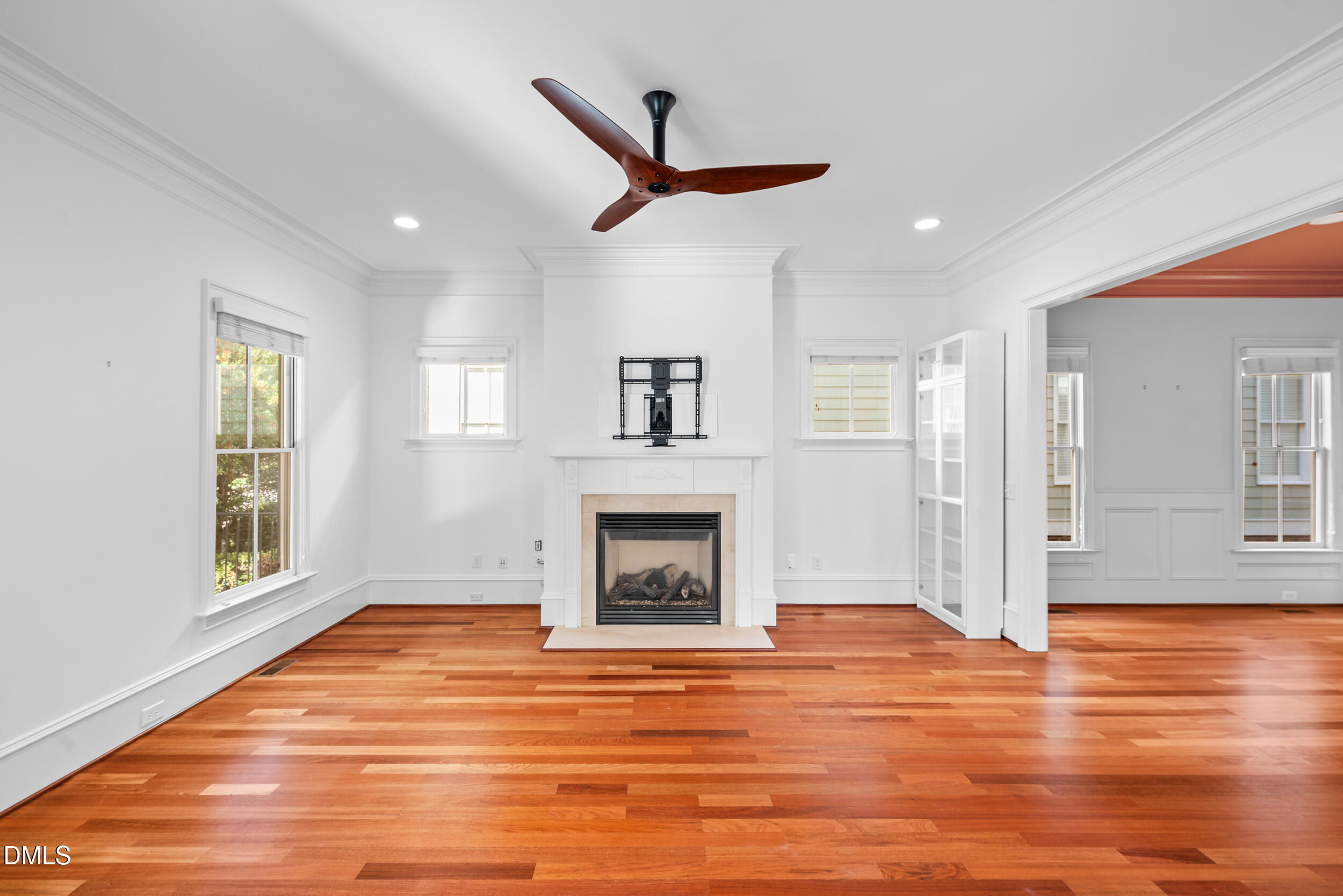 3100 Raymond Street Raleigh, NC 27607 - Photo 7 of 50 a view of livingroom with hardwood floor and a ceiling fan