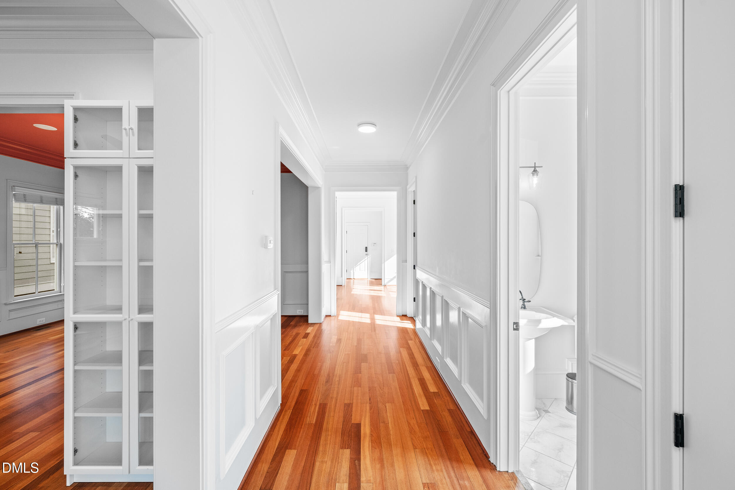3100 Raymond Street Raleigh, NC 27607 - Photo 9 of 50 a view of a hallway with wooden floor and staircase