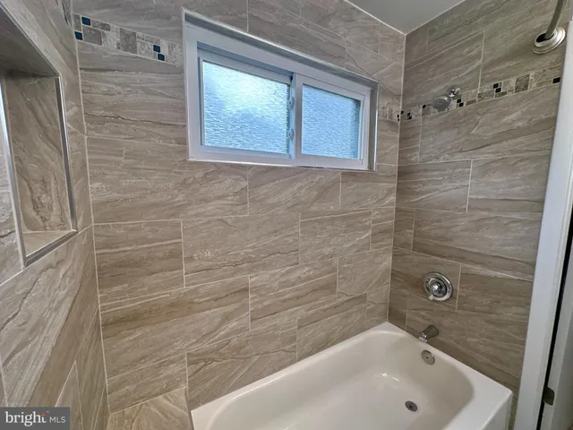 a bathroom with a tub