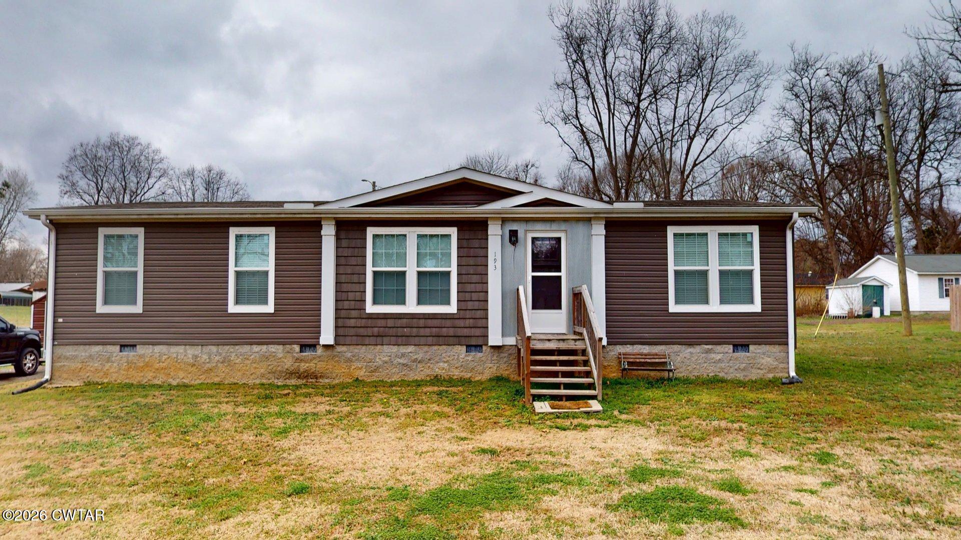 193 Wagner Street Trimble, TN 38259 - Photo 1 of 15 a front view of house with yard