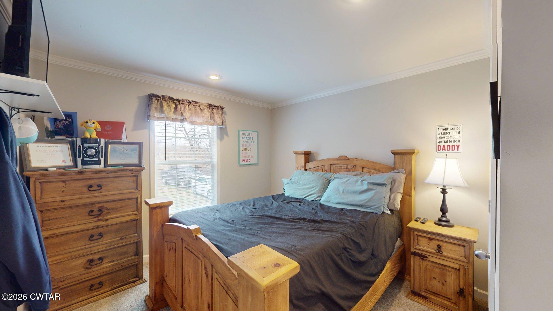 193 Wagner Street Trimble, TN 38259 - Photo 12 of 15 a bedroom with a bed and a window