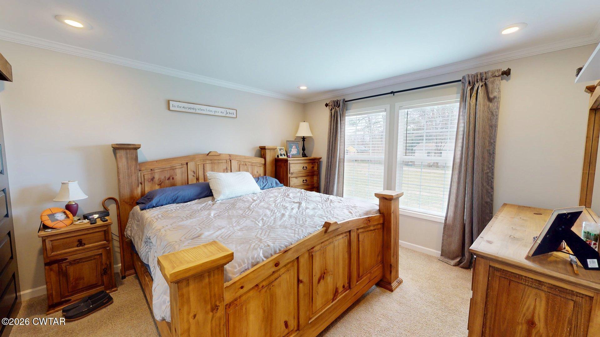 193 Wagner Street Trimble, TN 38259 - Photo 8 of 15 a bedroom with a bed and wooden floor