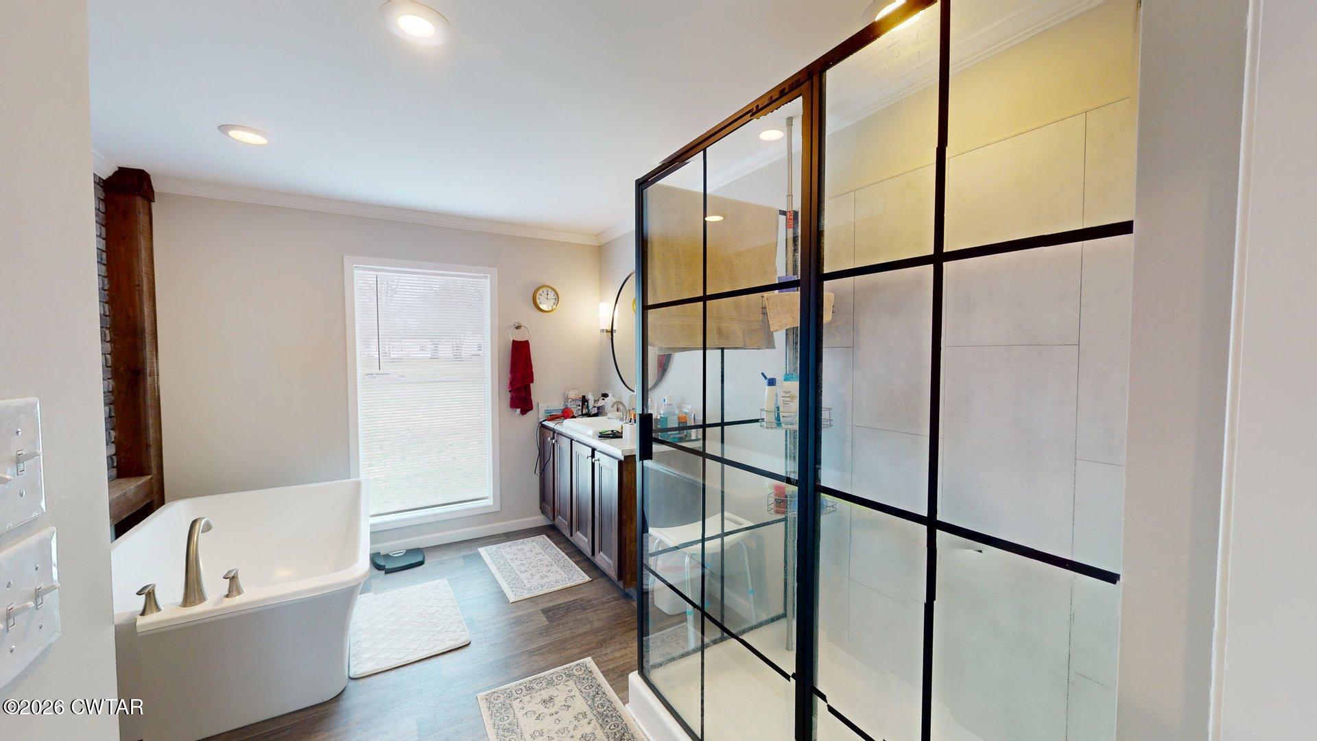 193 Wagner Street Trimble, TN 38259 - Photo 9 of 15 a bathroom with a tub and shower
