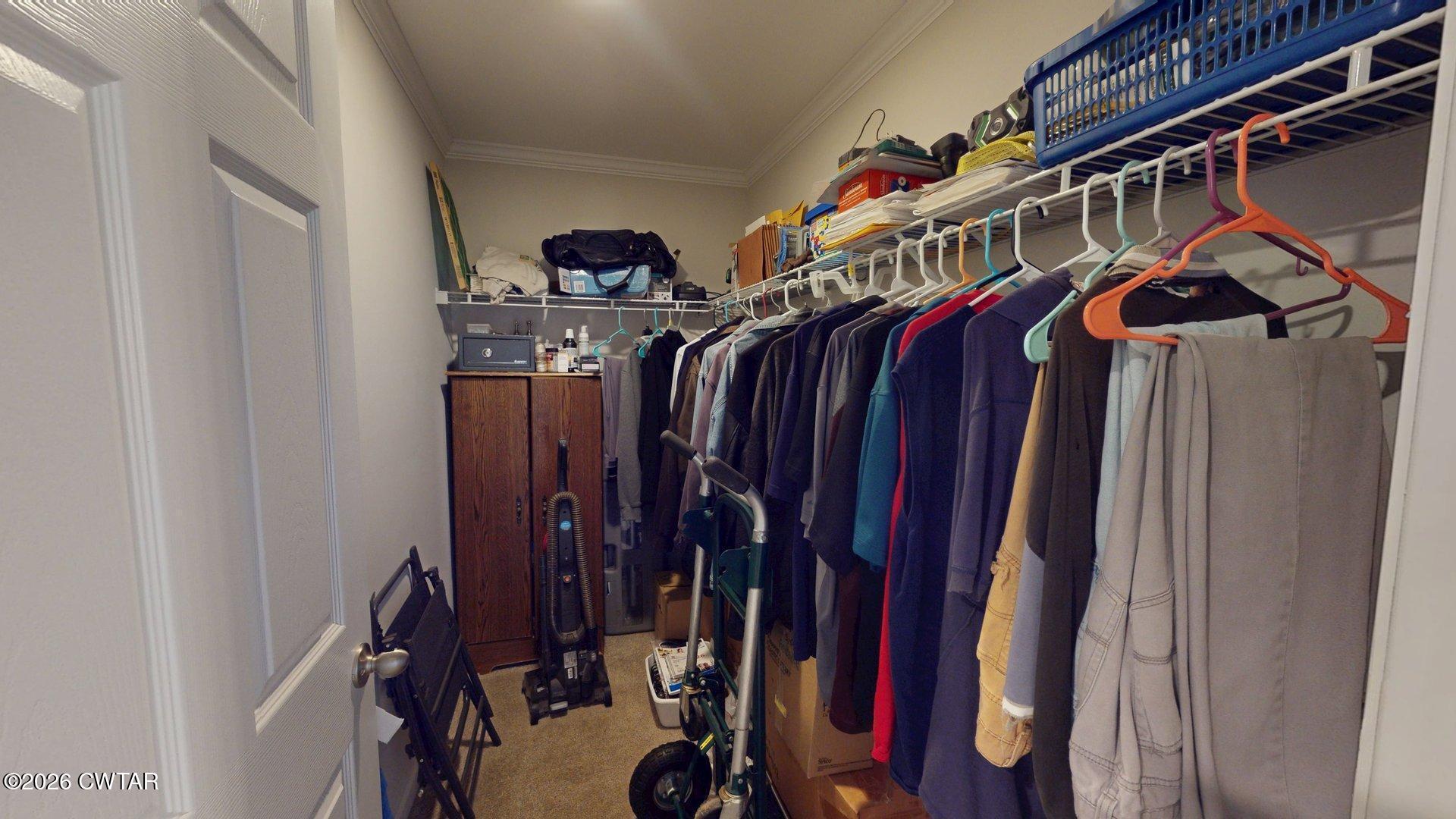 193 Wagner Street Trimble, TN 38259 - Photo 10 of 15 a view of walk in closet with clothes
