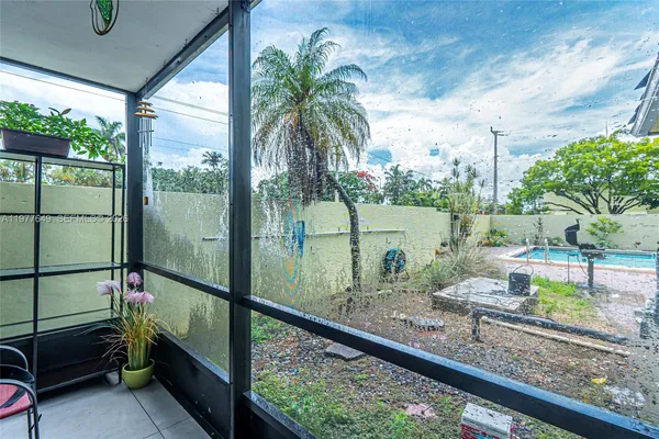 a view of a yard from a balcony