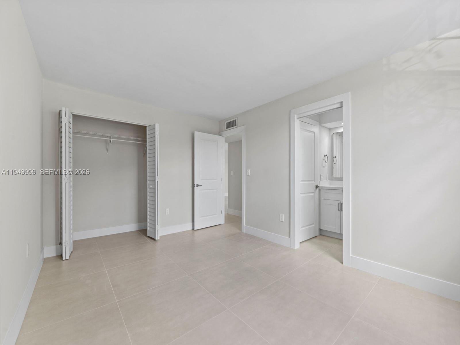 10825 Southwest 112th Avenue, Unit 206 Miami, FL 33176 - Photo 12 of 32 a view of an empty room and closet area