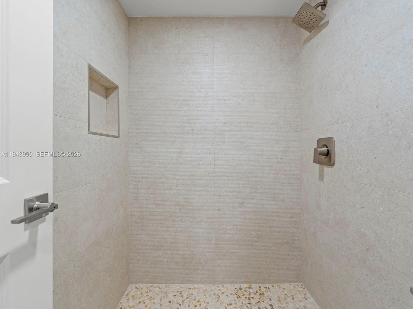 10825 Southwest 112th Avenue, Unit 206 Miami, FL 33176 - Photo 20 of 32 a bathroom with a shower
