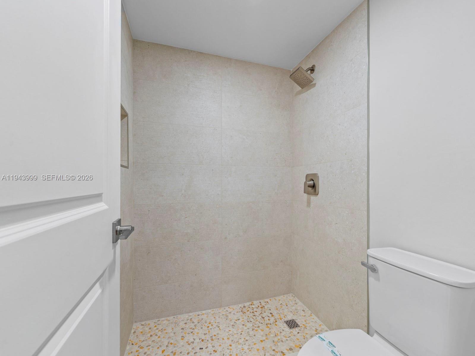 10825 Southwest 112th Avenue, Unit 206 Miami, FL 33176 - Photo 21 of 32 a bathroom with a sink and a toilet