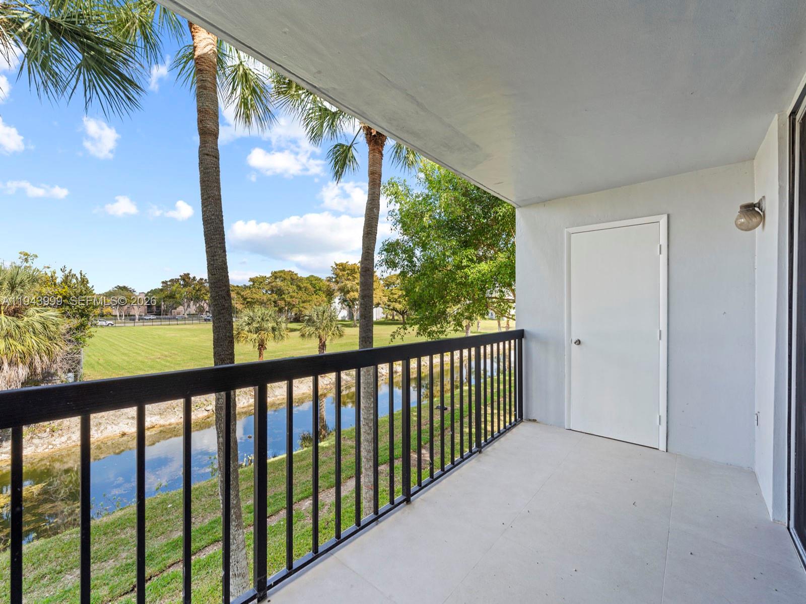10825 Southwest 112th Avenue, Unit 206 Miami, FL 33176 - Photo 23 of 32 a view of city from a balcony
