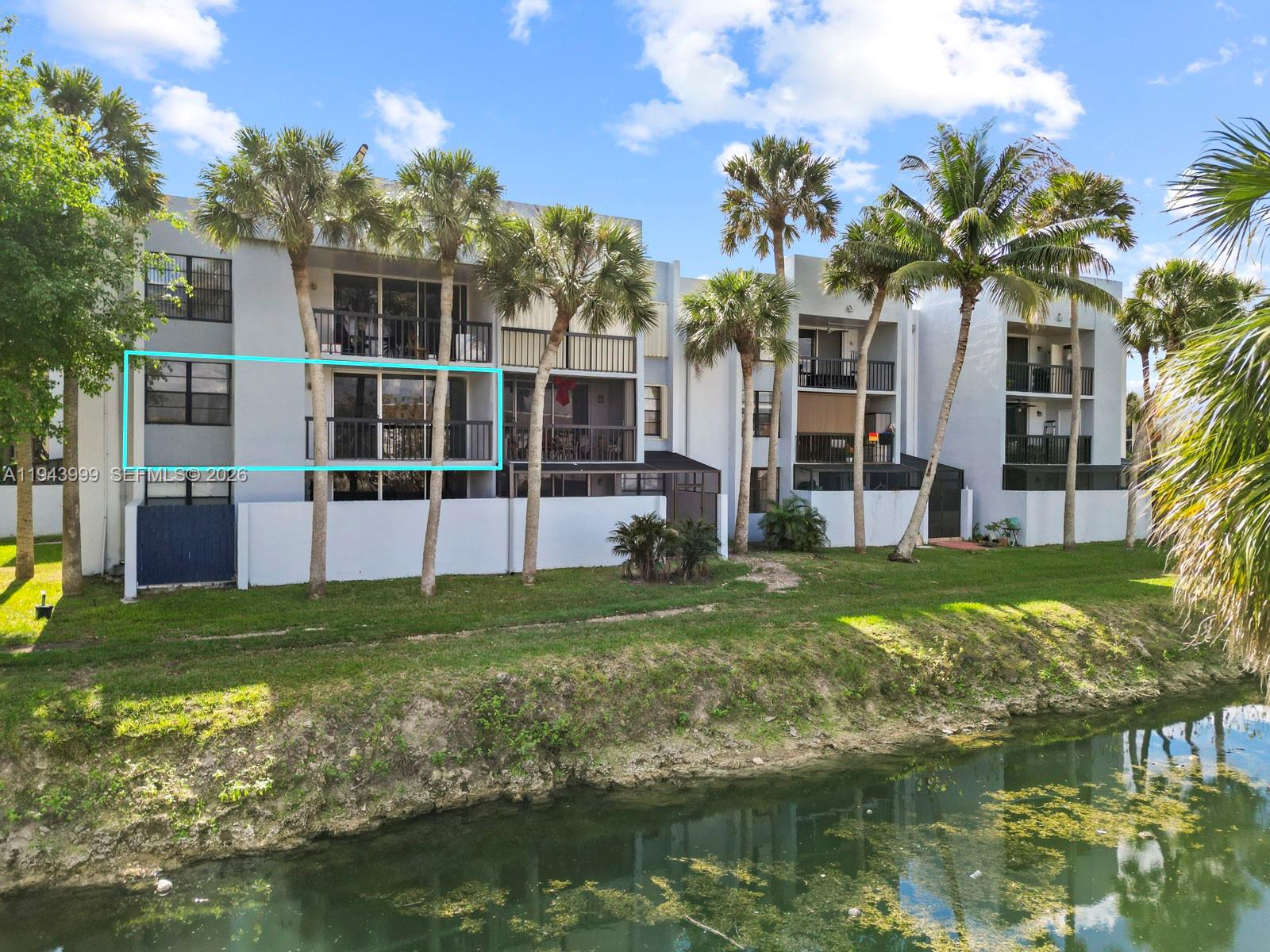 10825 Southwest 112th Avenue, Unit 206 Miami, FL 33176 - Photo 29 of 32 a view of a garden with a house
