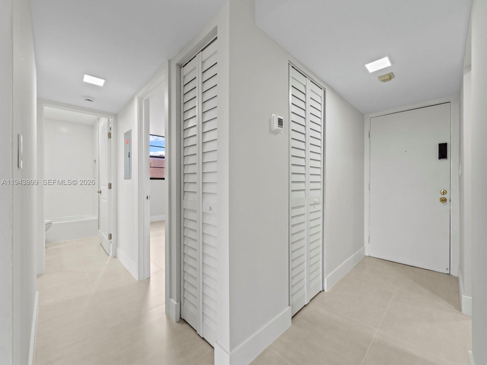 10825 Southwest 112th Avenue, Unit 206 Miami, FL 33176 - Photo 9 of 32 a view of an empty room with a closet