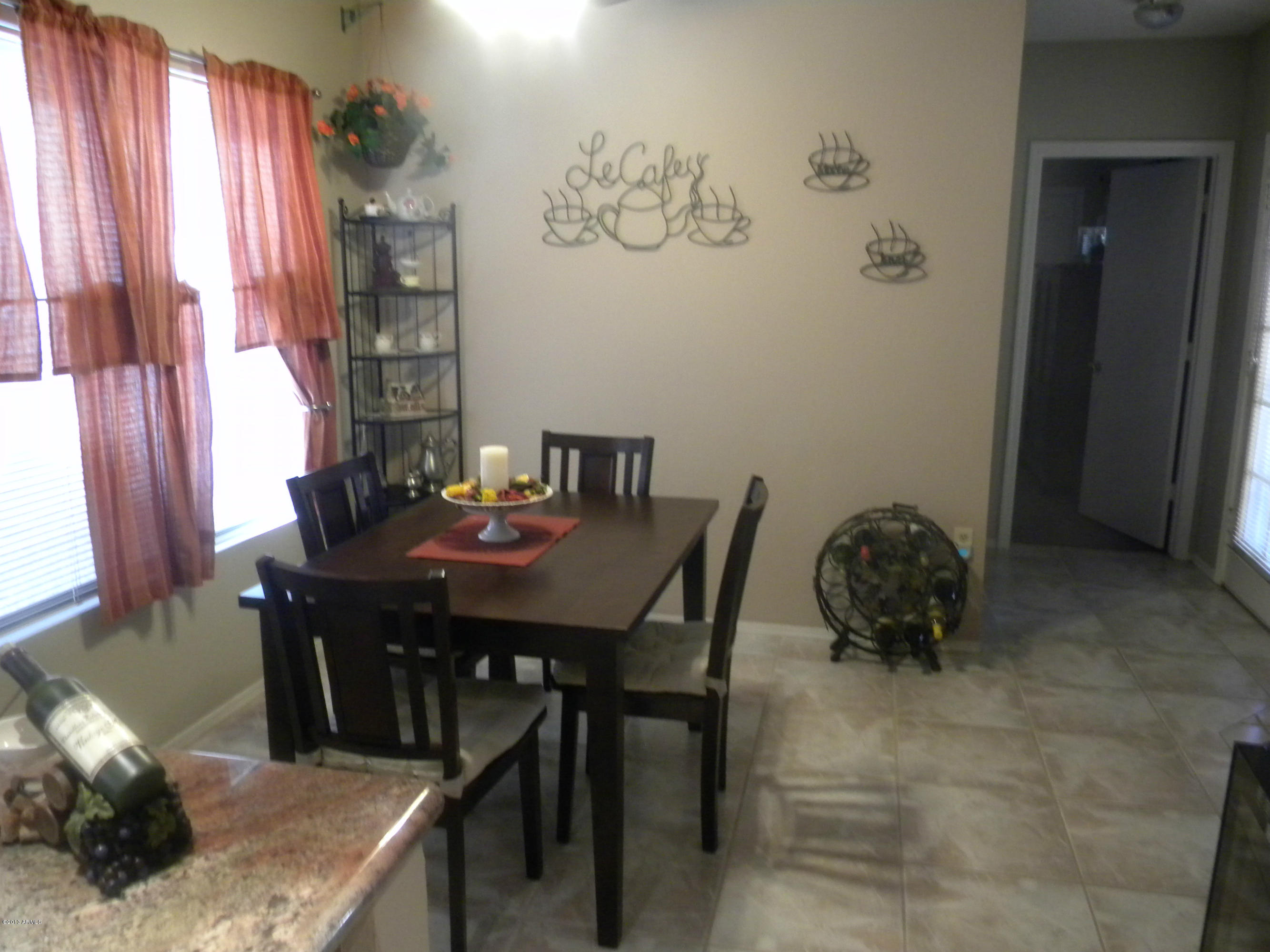 1326 East Mineral Road Gilbert, AZ 85234 - Photo 3 of 29 eat in kitchen / neutral tile floors