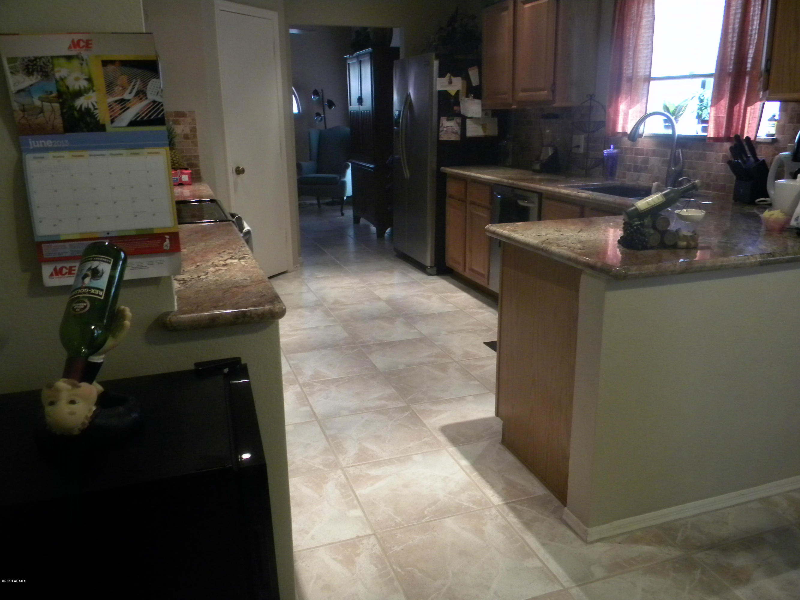 1326 East Mineral Road Gilbert, AZ 85234 - Photo 5 of 29 kitchen from dining area