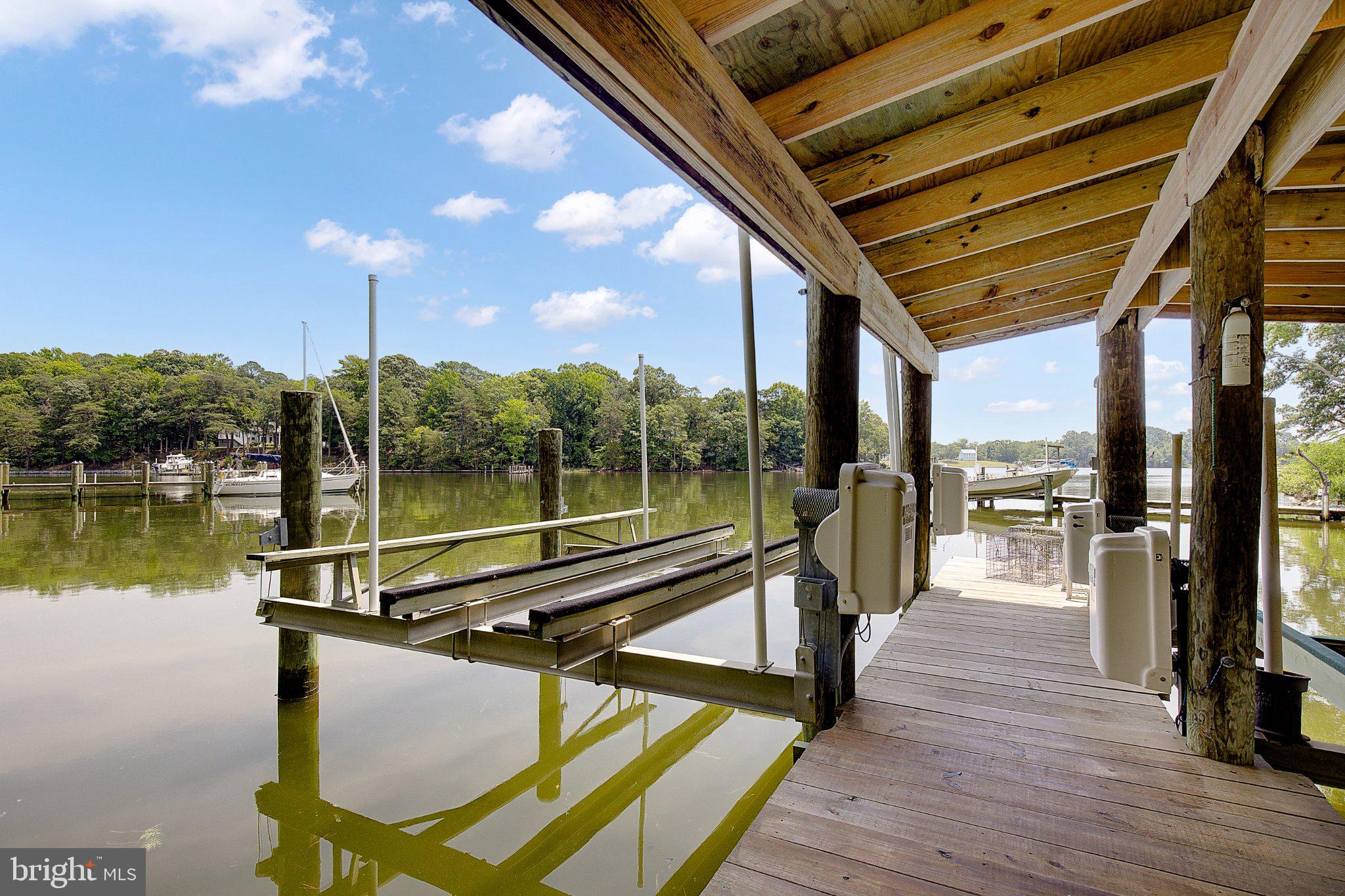 980 Apple Lane Solomons, MD 20629 - Photo 77 of 82 Serene dock by tranquil waters