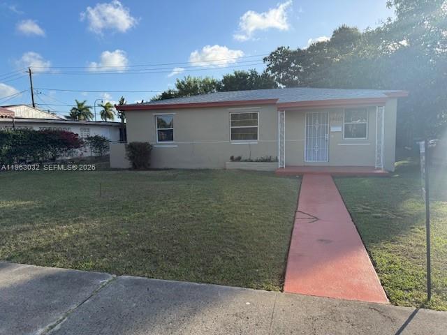14620 Monroe Street, Unit X Miami, FL 33176 - Photo 1 of 21 a front view of a house with garden