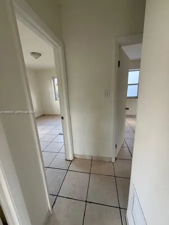 a bathroom with a sink a toilet and bathtub