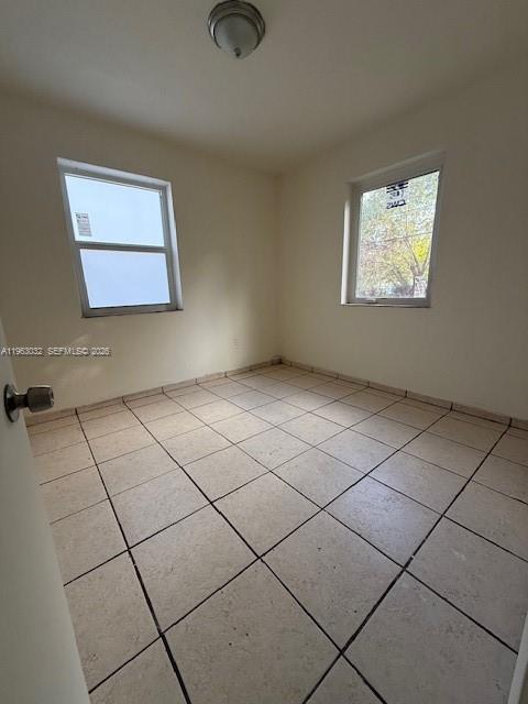 14620 Monroe Street, Unit X Miami, FL 33176 - Photo 17 of 21 an empty room with windows