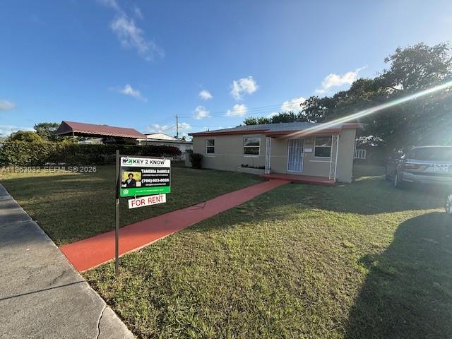 14620 Monroe Street, Unit X Miami, FL 33176 - Photo 2 of 21 a view of a backyard