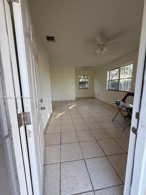 14620 Monroe Street, Unit X Miami, FL 33176 - Photo 3 of 21 a view of an empty room and a window