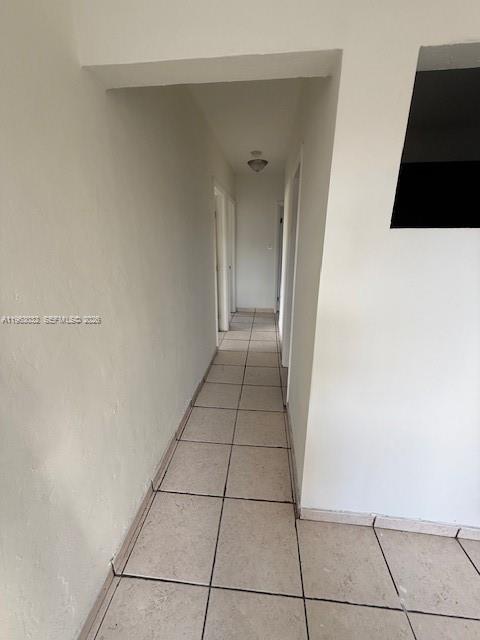 14620 Monroe Street, Unit X Miami, FL 33176 - Photo 6 of 21 a view of a livingroom with an empty space and a window