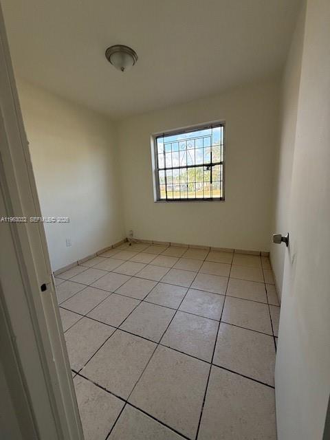 14620 Monroe Street, Unit X Miami, FL 33176 - Photo 10 of 21 a view of an empty room with a window