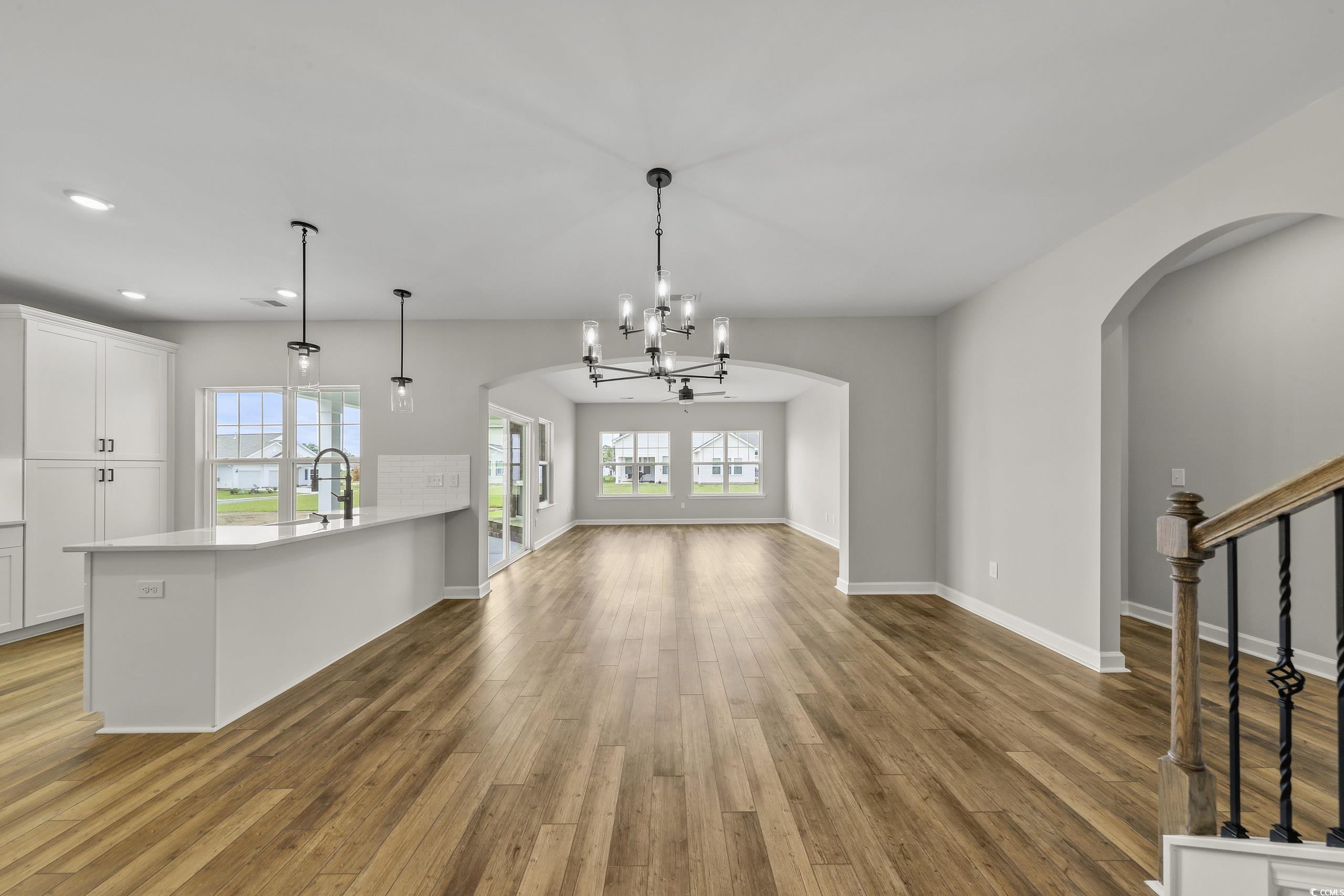 Interior space featuring a chandelier and light ha