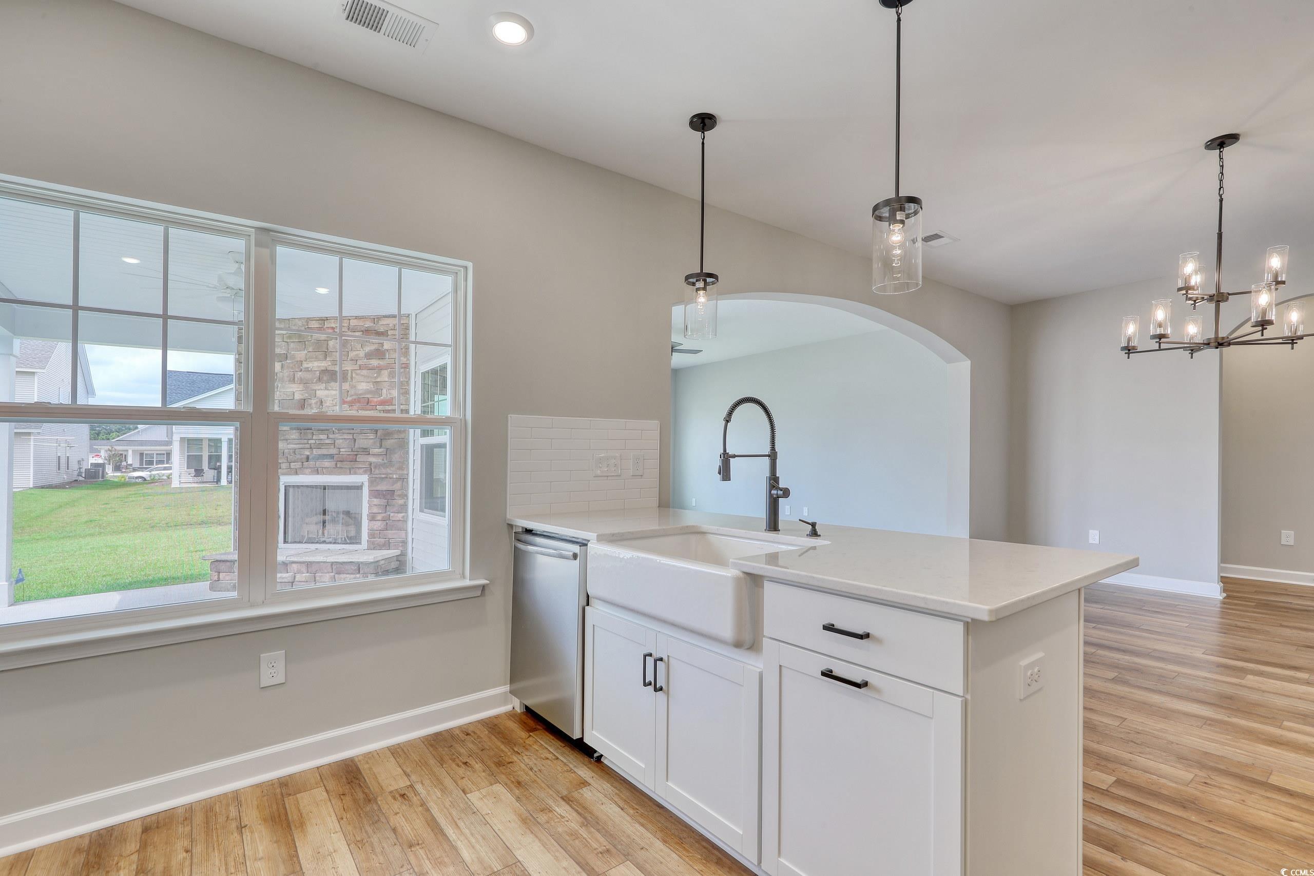 143 Azure Loop Myrtle Beach, SC 29588 - Photo 9 of 40 Kitchen featuring dishwasher, decorative light fix
