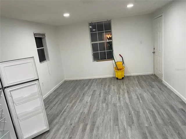 a bathroom with a toilet and shower