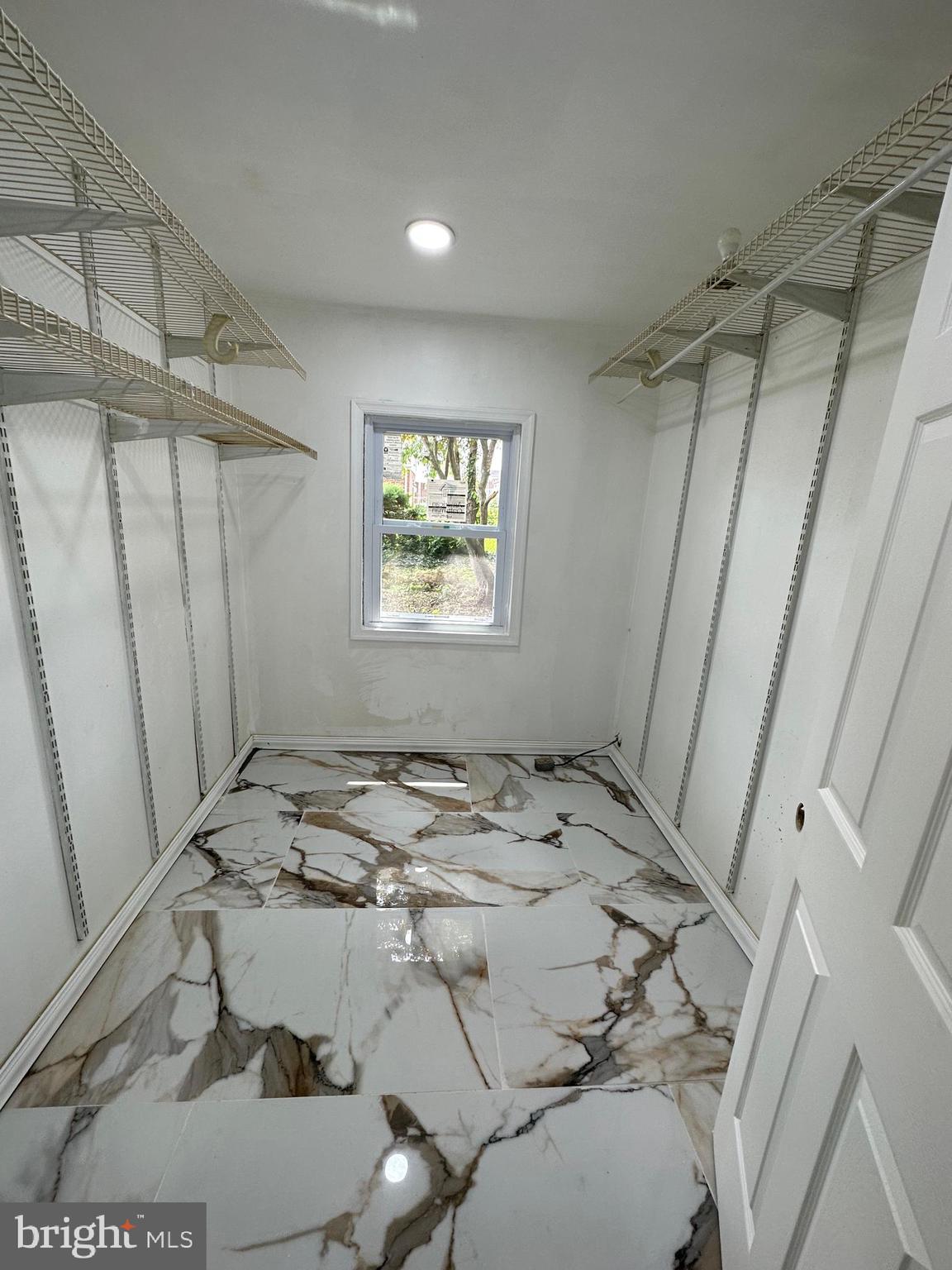 682 Rennard Street Philadelphia, PA 19116 - Photo 22 of 24 a view of a bathroom with a sink and a toilet