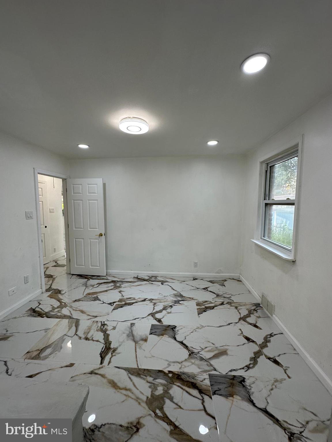 682 Rennard Street Philadelphia, PA 19116 - Photo 5 of 24 a view of an empty room