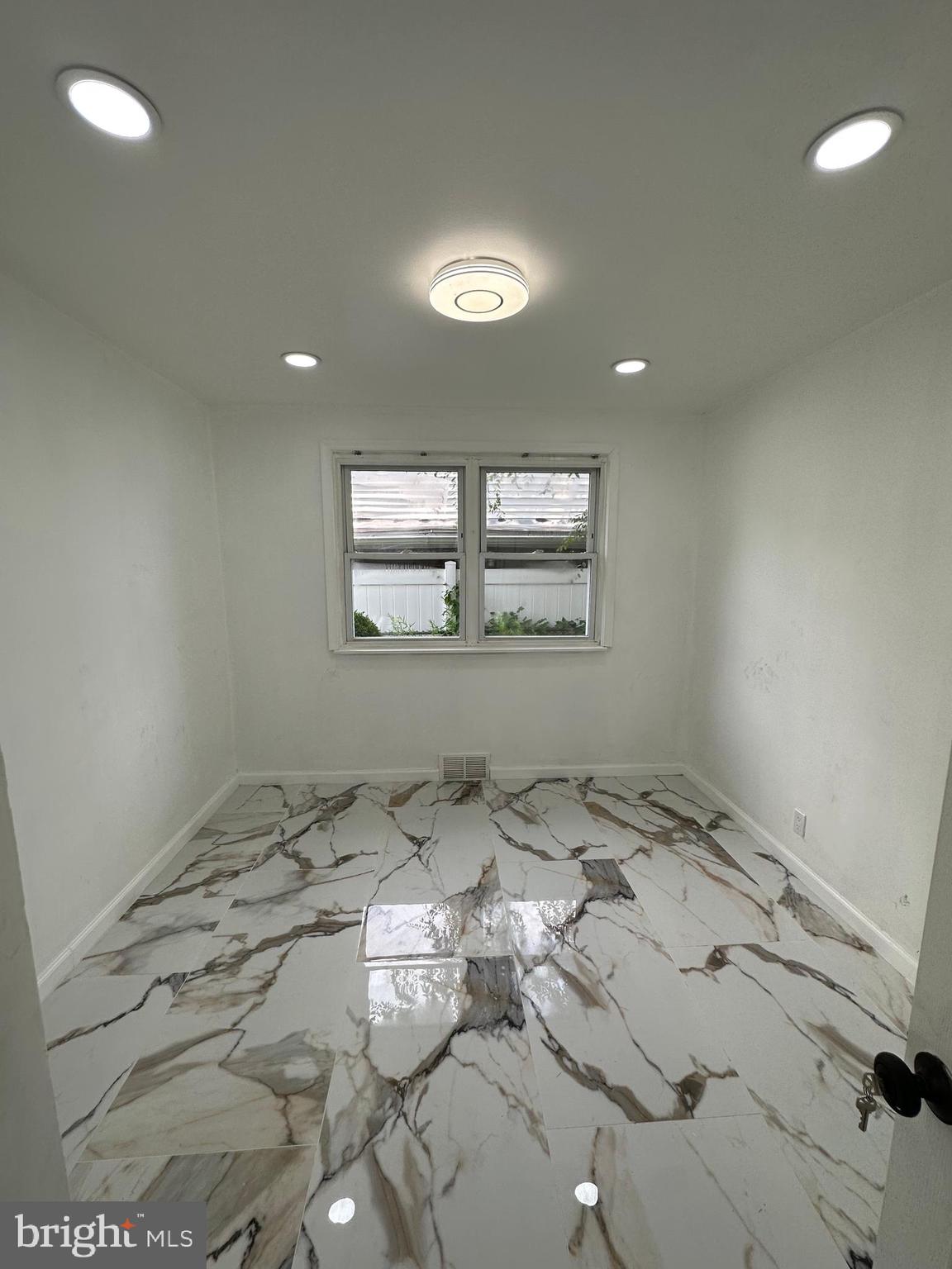 682 Rennard Street Philadelphia, PA 19116 - Photo 10 of 24 a view of a room with a bed
