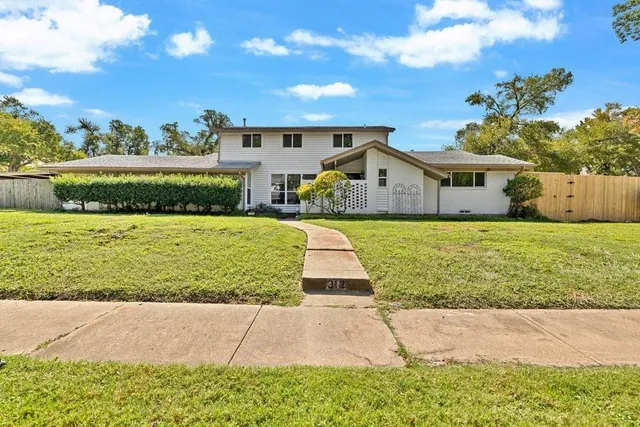 a view of a house with garden