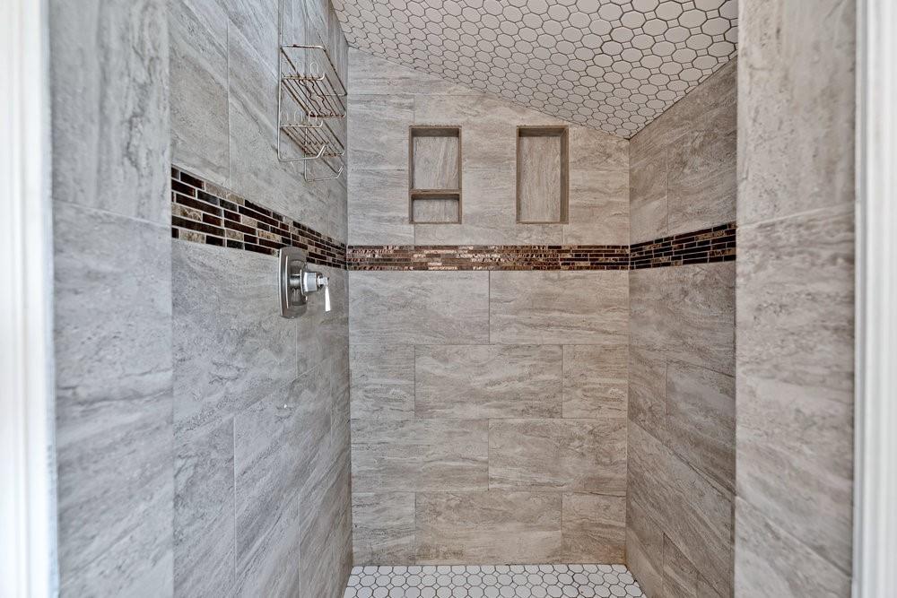 312 West Rio Grande Street Garland, TX 75041 - Photo 12 of 35 a bathroom with a shower