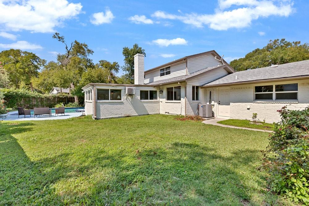 312 West Rio Grande Street Garland, TX 75041 - Photo 23 of 35 a front view of a house with garden